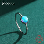 Anel Modian Feminino em Prata 925 com Opala Redonda Brilhante